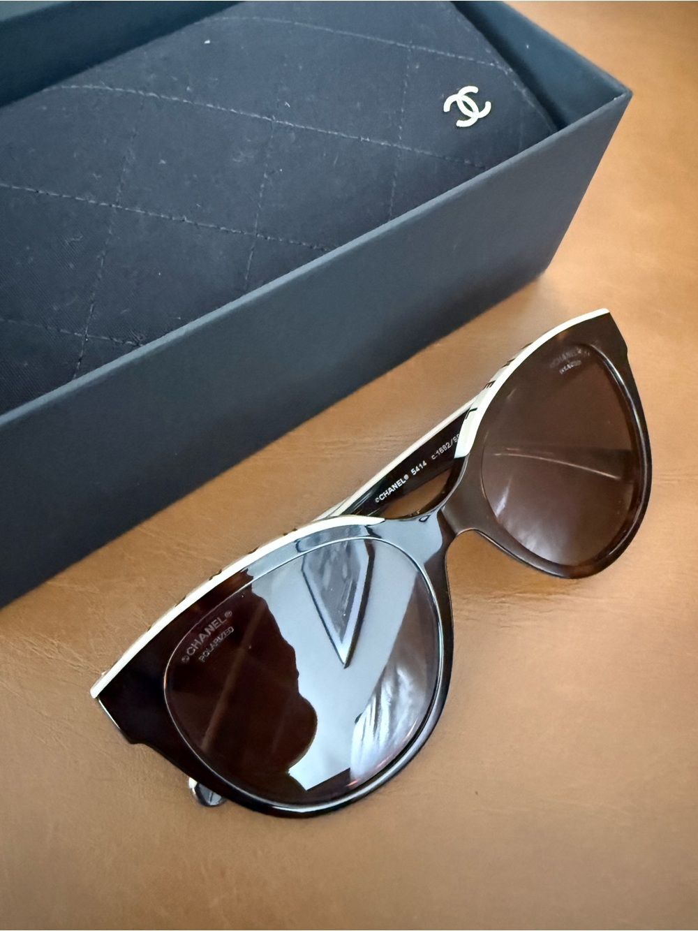 CHANEL Black Sunglasses with Gold Accent Cat-Eye Style